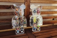 a set of plastic figures on a wooden bench